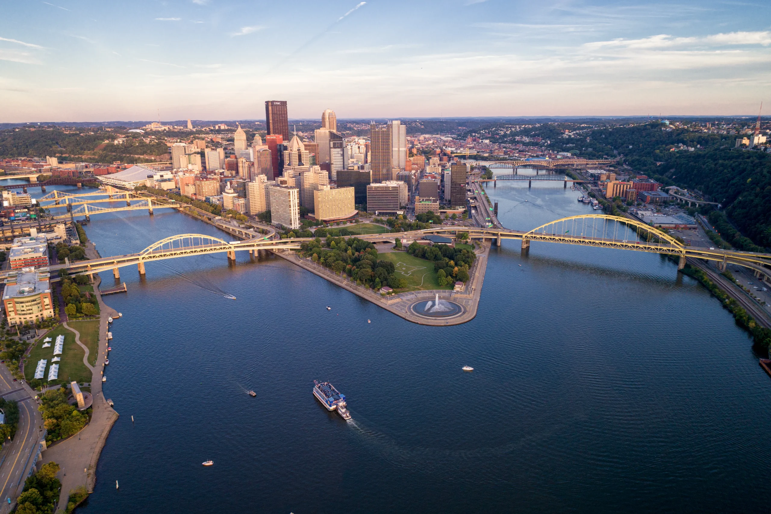 Pittsburgh's three rivers and downtown skyline at dusk