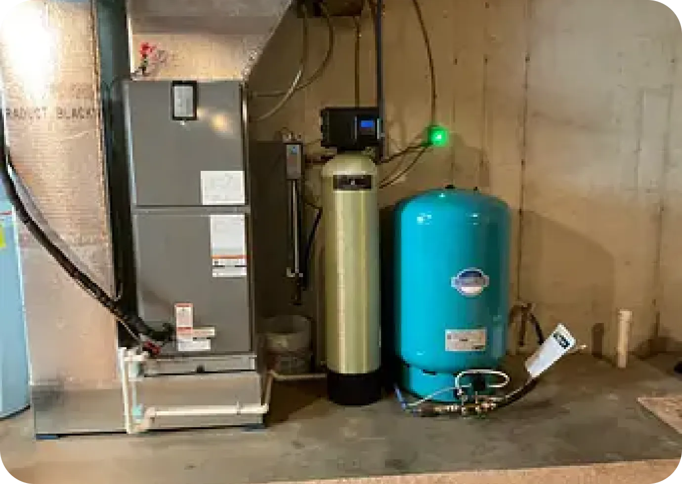 Whole-house water filtration system and well pressure tank installed by Cesare's
