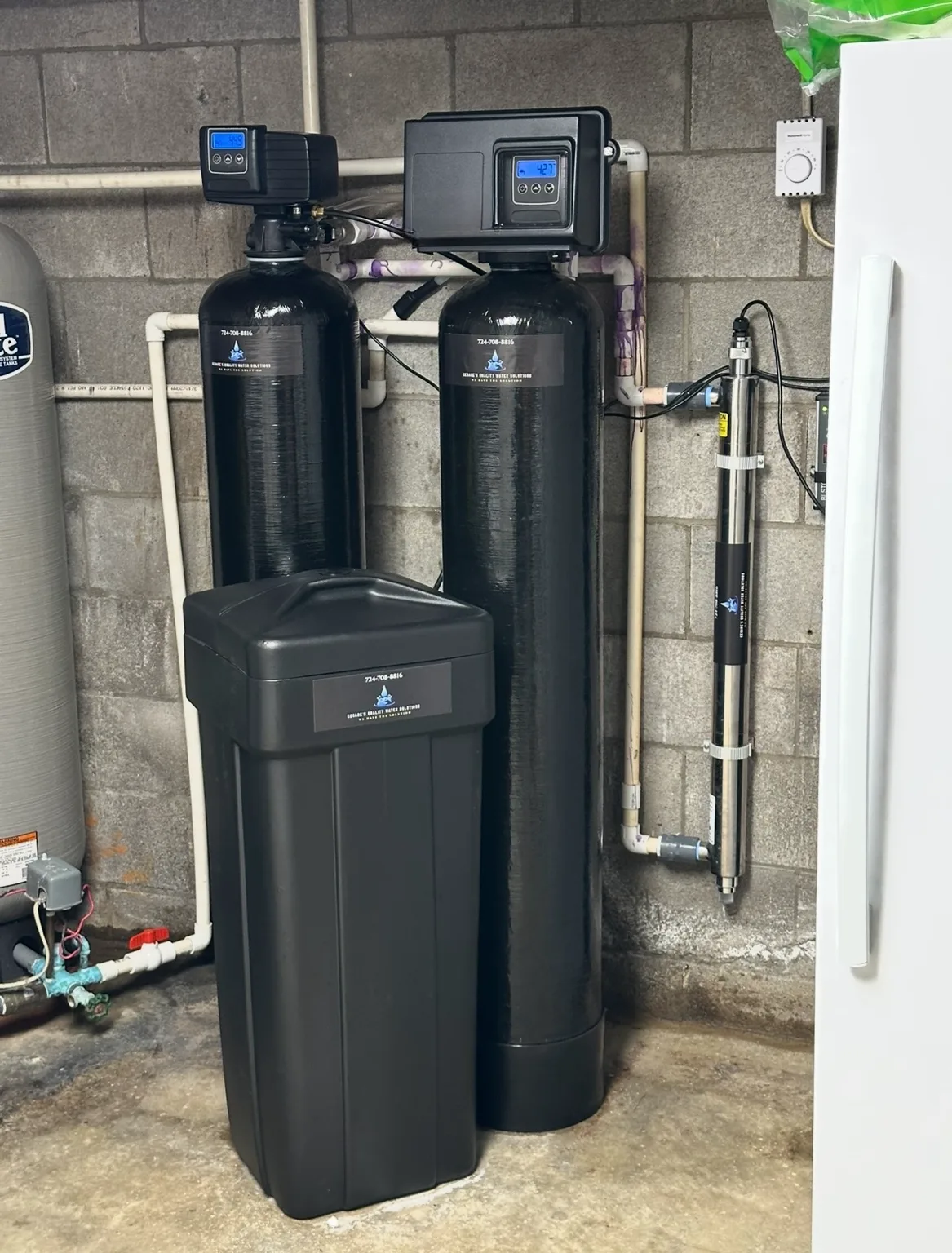 Custom whole-home manganese removal system with oxidation, filtration, softening and UV disinfection installed in Southwestern Pennsylvania.